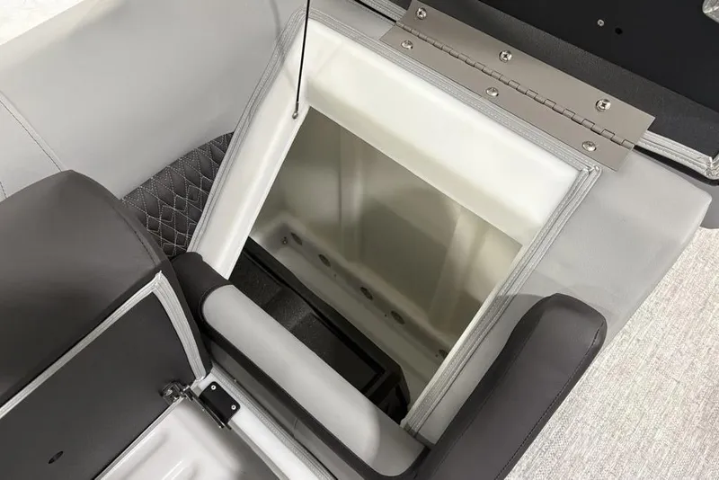 Slide: The Image of Open storage compartment in 2026 Premier 230 Solaris RF boat interior. - 35