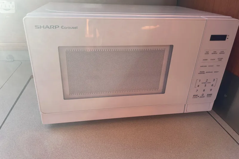 Slide: The Image of Sharp Carousel microwave on Jeanneau Sun Odyssey 43 DS yacht, 2003 model. - 26