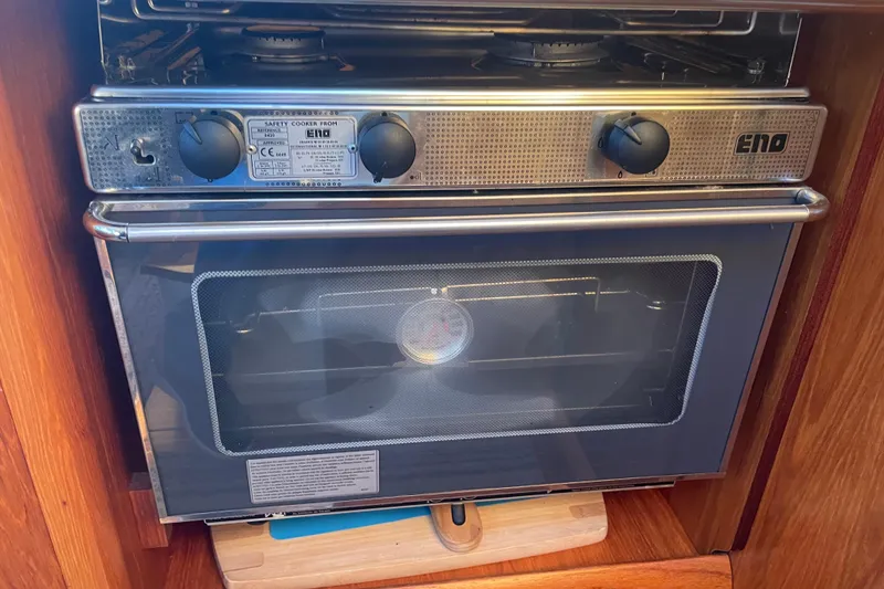 Slide: The Image of Stainless steel oven in 2003 Jeanneau Sun Odyssey 43 DS yacht kitchen. - 29