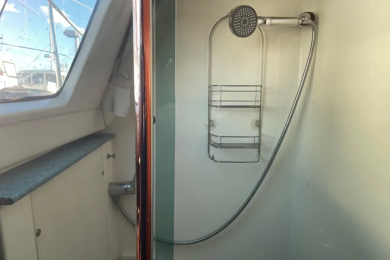 Slide: The Image of Shower area inside 2003 Jeanneau Sun Odyssey 43 DS sailboat, featuring modern fixtures. - 37