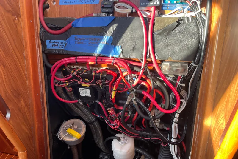 Slide: The Image of Electrical wiring and components inside a 2003 Jeanneau Sun Odyssey 43 DS sailboat. - 50