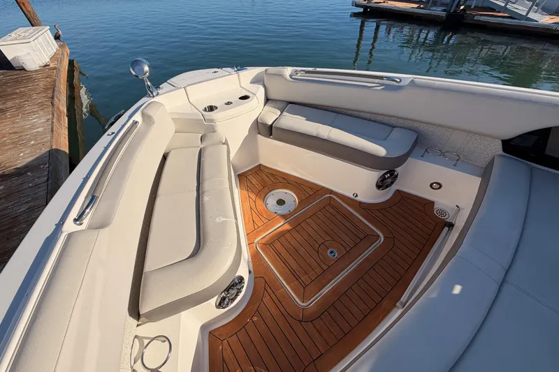 Slide: The Image of Luxurious 2021 Sea Ray SLX 400 boat interior with elegant seating and teak flooring. - 43