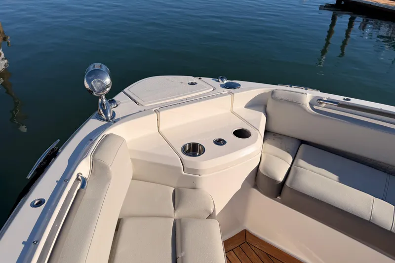Slide: The Image of Luxurious seating area on 2021 Sea Ray SLX 400 boat, featuring cup holders and elegant design. - 44
