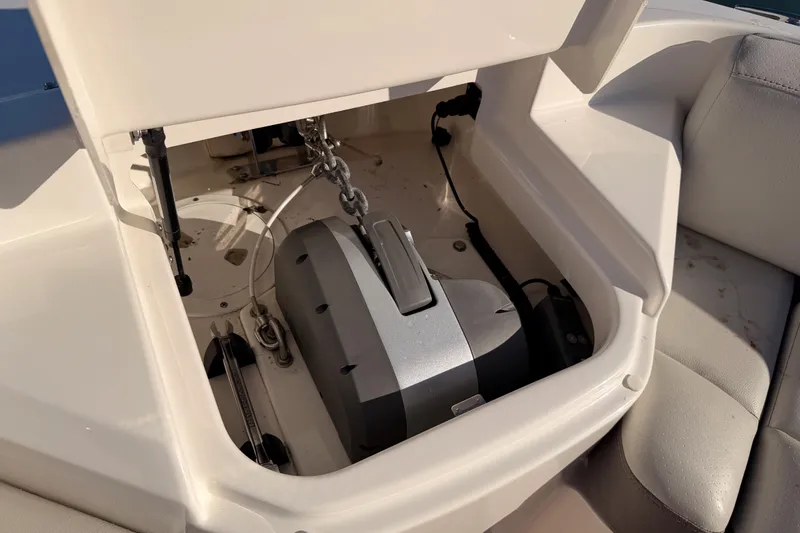 Slide: The Image of 2021 Sea Ray SLX 400 anchor compartment with chain and winch system. - 45