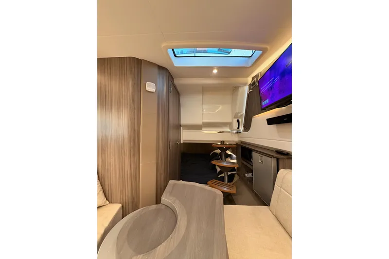 Slide: The Image of Luxurious interior of 2021 Sea Ray SLX 400 yacht with modern amenities and stylish design. - 60