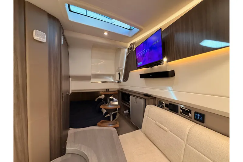 Slide: The Image of Luxurious interior of 2021 Sea Ray SLX 400 yacht with modern amenities and elegant design. - 61