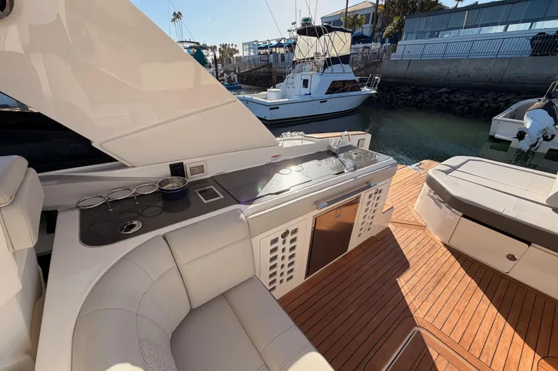 Slide: The Image of Luxurious 2021 Sea Ray SLX 400 yacht interior with sleek seating and modern amenities. - 74