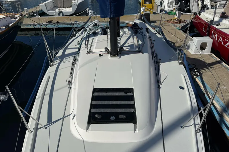 Slide: The Image of 2014 J Boats J/88 sailboat docked at marina, top deck view. - 12