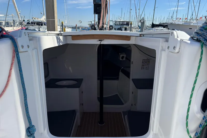 Slide: The Image of Interior view of 2014 J Boats J/88 sailboat cabin at marina. - 18