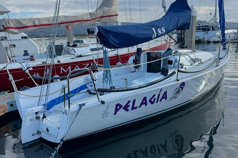 Slide: The Image of 2014 J Boats J/88 sailboat named Pelagia docked at marina. - 2