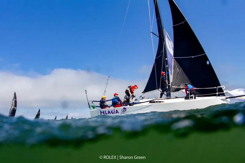 Slide: The Image of Sailing race featuring a 2014 J Boats J/88 with crew on deck. - 26
