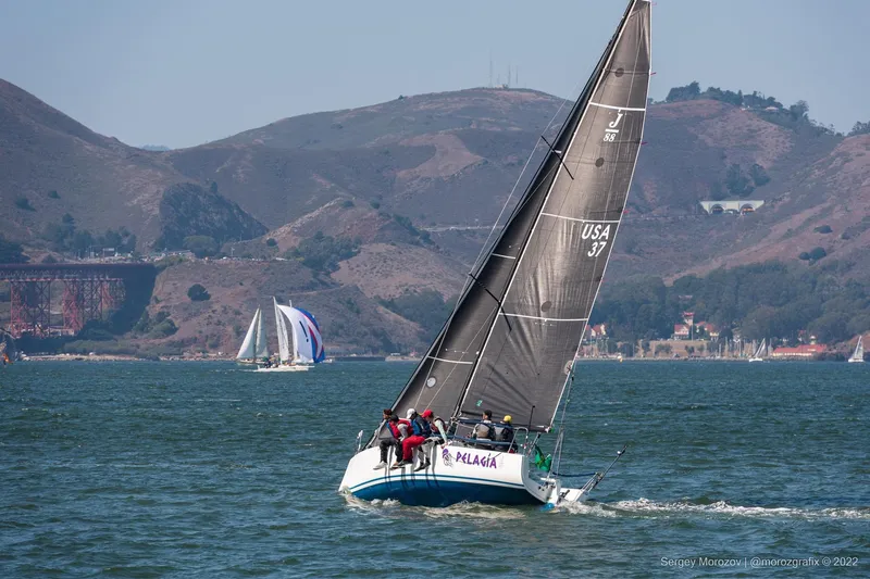 Slide: The Image of Sailing J/88 boat on scenic water with hills in background, 2014 model. - 29