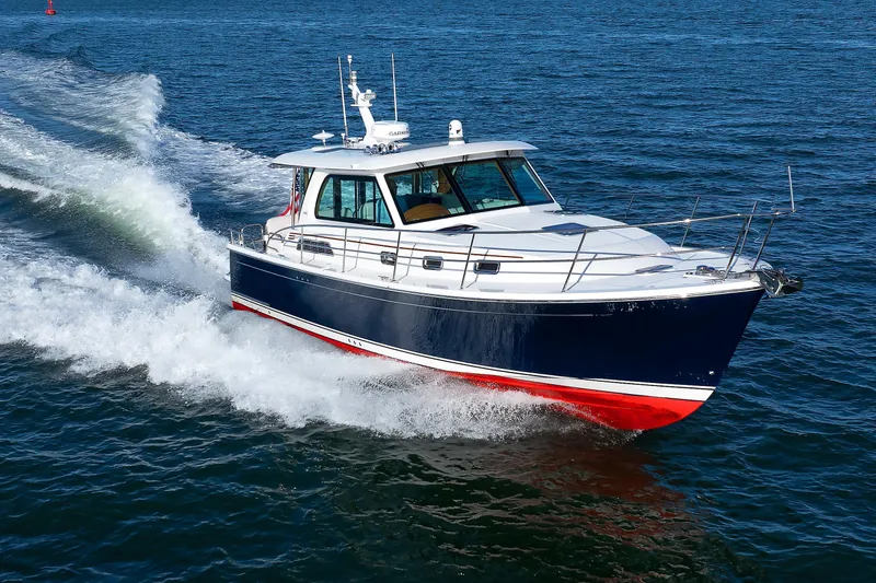 The Image of 2022 Sabre 38 SE boat cruising on open water, showcasing sleek design and performance. - 1