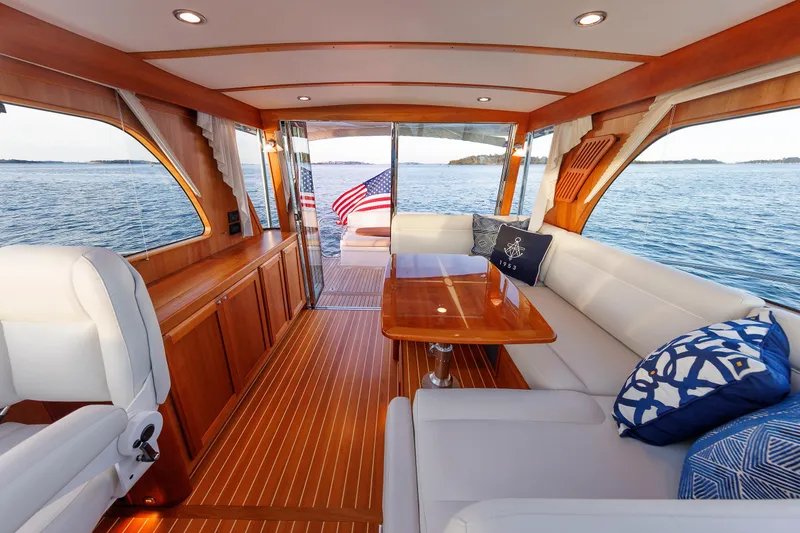 Slide: The Image of Luxurious interior of 2022 Sabre 38 SE yacht with elegant wood finish and comfortable seating. - 11