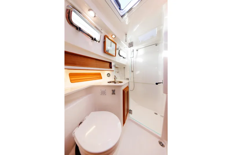 Slide: The Image of 2022 Sabre 38 SE yacht bathroom with modern fixtures and sleek design. - 30