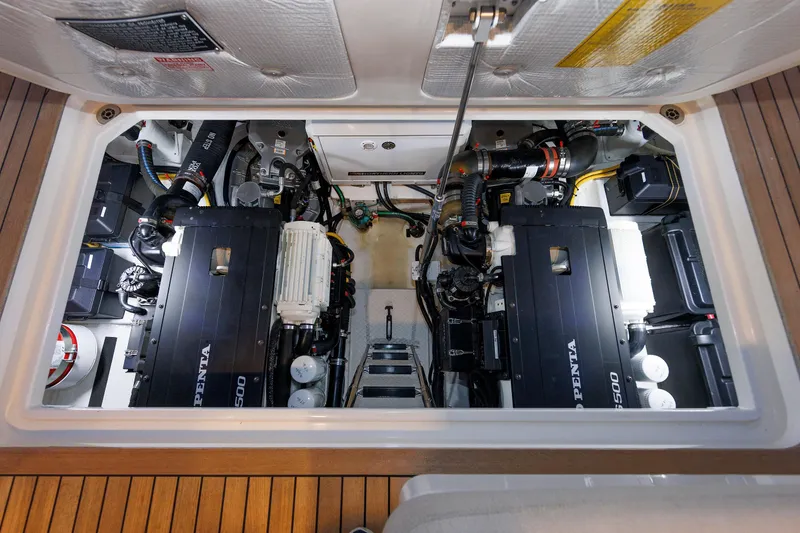 Slide: The Image of Engine compartment of 2022 Sabre 38 SE yacht with twin Volvo Penta engines. - 32