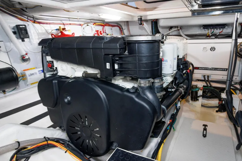 Slide: The Image of Engine room of 2022 Sabre 38 SE yacht, featuring advanced mechanical systems. - 35