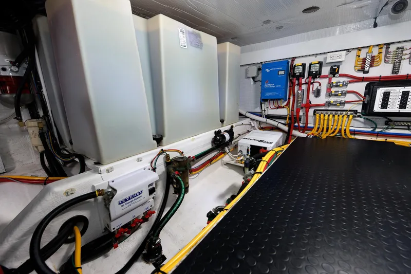 Slide: The Image of Engine room of 2022 Sabre 38 SE yacht with wiring and equipment. - 39