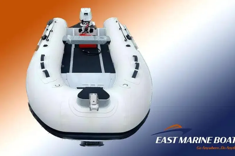 Slide: The Image of 2026 East Marine 300 inflatable boat with motor, on gradient background. - 5