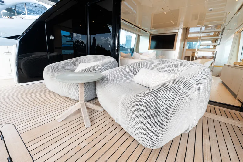 Slide: The Image of Luxurious twin cabin on 2019 Sanlorenzo SX76 yacht with modern decor and porthole view. - 21