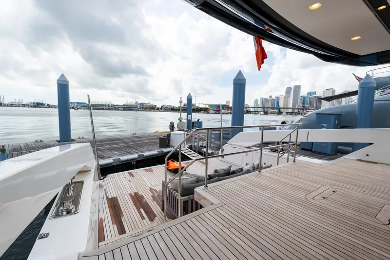 Slide: The Image of Luxurious 2019 Sanlorenzo SX76 yacht interior with modern seating and sleek design. - 26