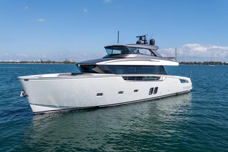 Slide: The Image of Luxurious interior of 2019 Sanlorenzo SX76 yacht with plush seating and large window view. - 8