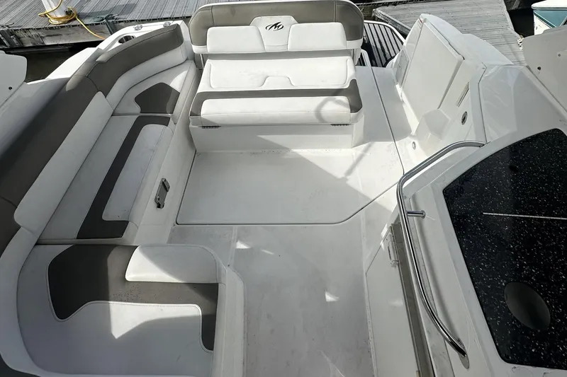 Slide: The Image of 2016 Monterey 295 Sport Yacht interior with spacious seating and sleek design. - 5