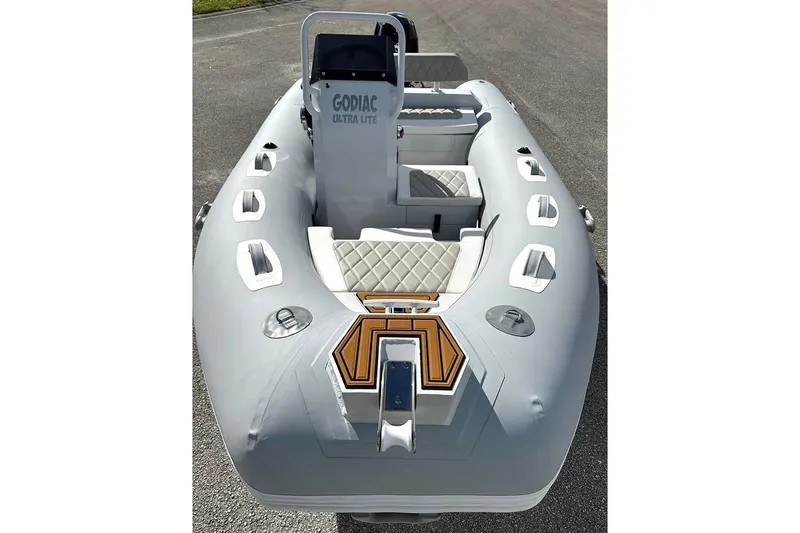 Slide: The Image of Manufacturer Provided Image: Inflatable boat East Marine 360, 2025 model, featuring a sleek design and comfortable seating. - 10