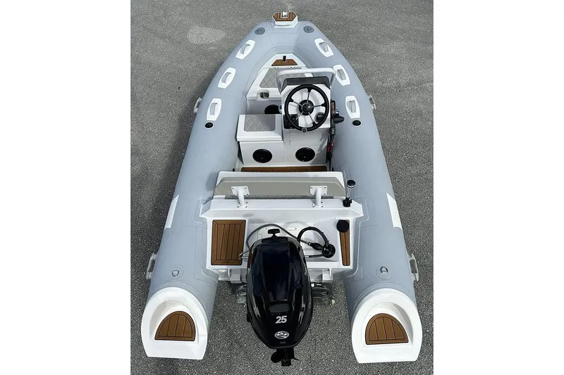 Slide: The Image of Manufacturer Provided Image: 2025 East Marine 360 inflatable boat with outboard motor, top view. - 13