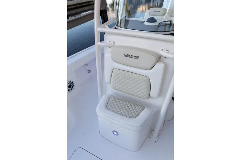 Slide: The Image of 2022 Caymas 28 HB Twin boat seat with quilted upholstery and logo. - 20