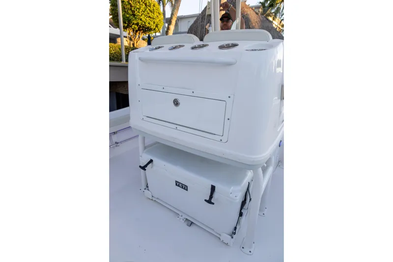 Slide: The Image of 2022 Caymas 28 HB Twin boat console with Yeti cooler underneath. - 22