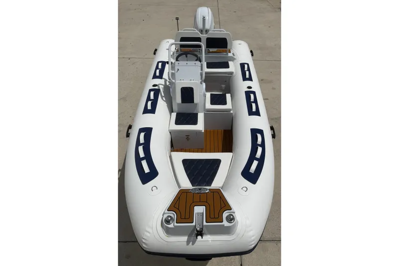 Slide: The Image of 2026 East Marine 420 LUXURY inflatable boat with sleek design and modern features. - 9
