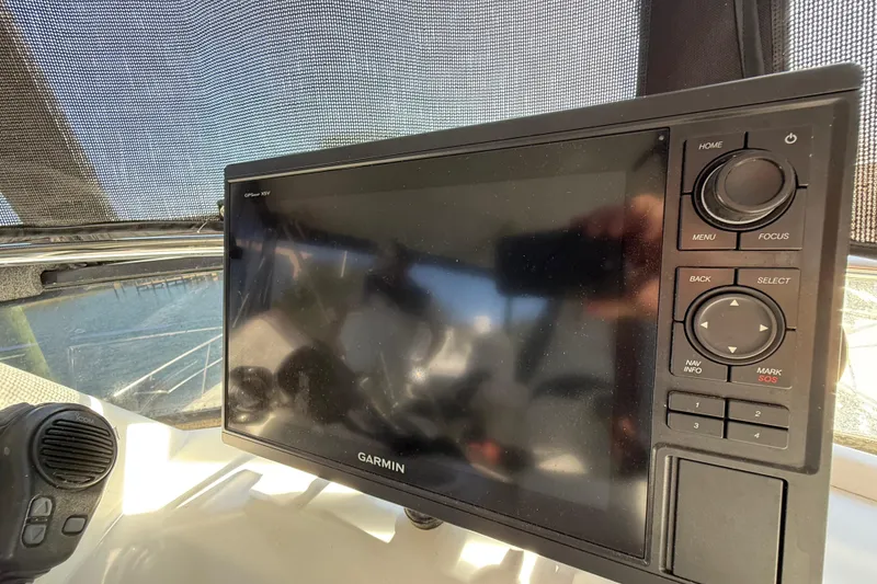 Slide: The Image of Interior view of 1991 Californian 55 Cockpit Motor Yacht with stairs and cozy seating area. - 22