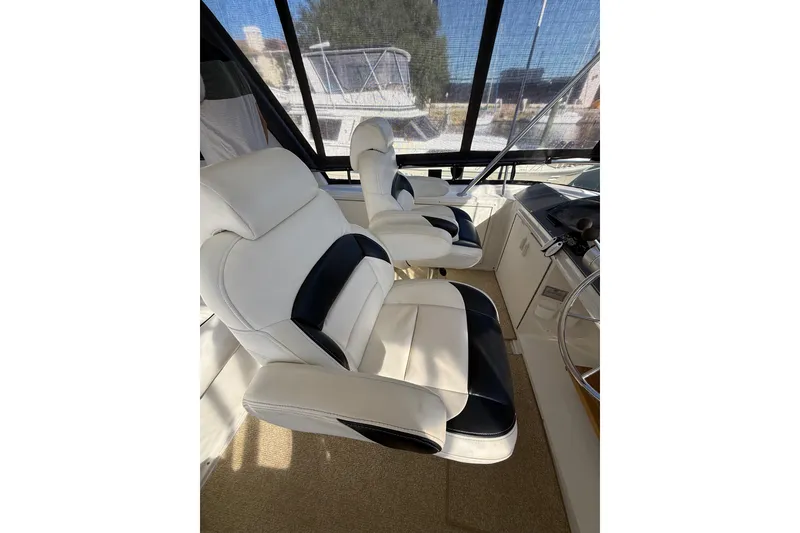 Slide: The Image of Simrad control panel on 1991 Californian 55 Cockpit Motor Yacht dashboard. - 28