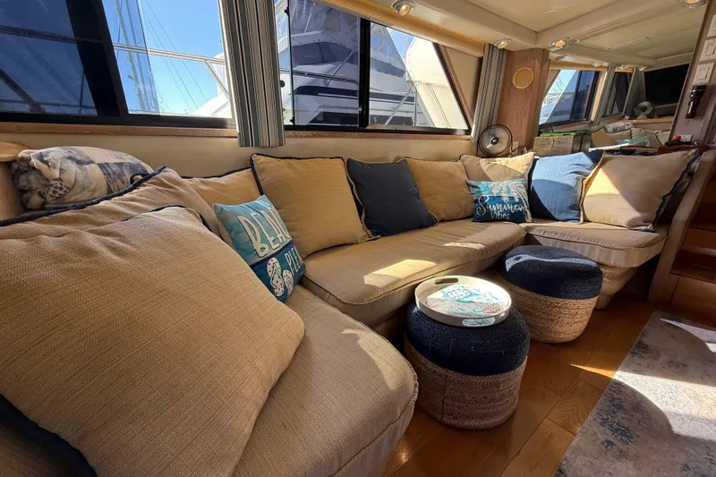 Slide: The Image of Compact fridge and storage in 1991 Californian 55 Cockpit Motor Yacht interior. - 36