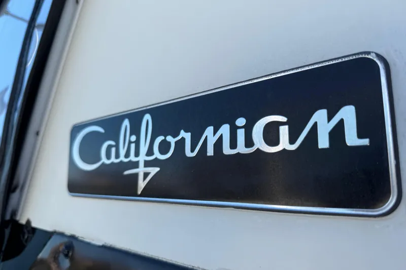 Slide: The Image of Californian 55 Cockpit Motor Yacht 1991 logo on yacht exterior. - 71