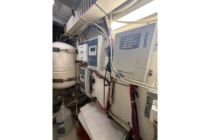 Slide: The Image of Electrical system inside 1991 Californian 55 Cockpit Motor Yacht, featuring Xantrex TrueCharge2. - 74