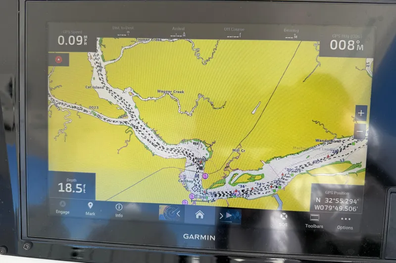Slide: The Image of Garmin GPS display on 2021 Regal 33 SAV, showing navigation map and coordinates. - 14