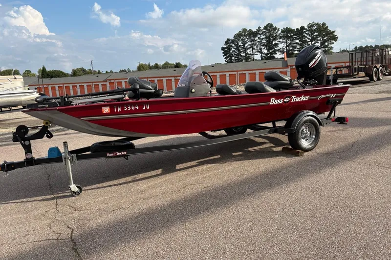 The Image of 2020 Tracker Bass Tracker Classic XL boat on trailer, parked outdoors. - 0