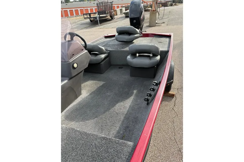 Slide: The Image of 2020 Tracker Bass Tracker Classic XL boat interior with seating and steering console. - 4