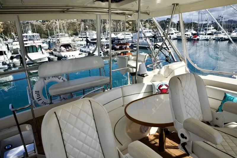 Slide: The Image of Luxurious 2002 Mikelson 50 Sportfisher yacht interior with marina view. - 46