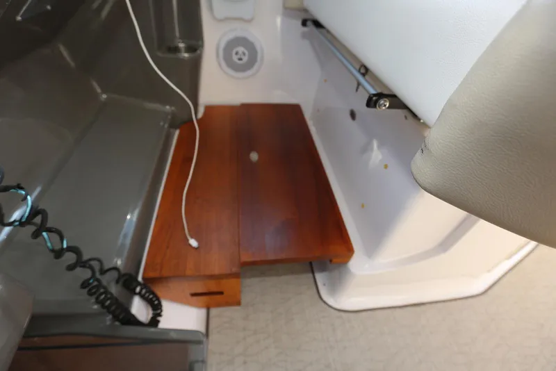 Slide: The Image of Interior of 2012 Regal 35 Sport Coupe with wooden panel and cables. - 110