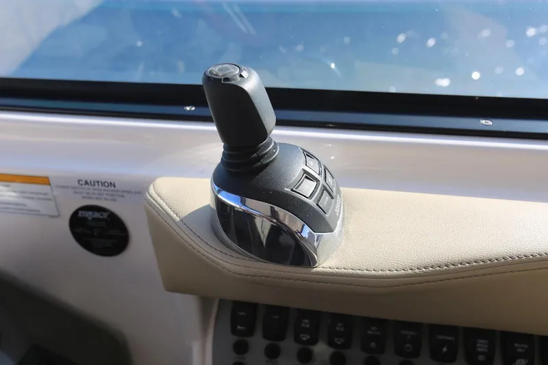 Slide: The Image of Joystick control on 2012 Regal 35 Sport Coupe boat dashboard. - 18