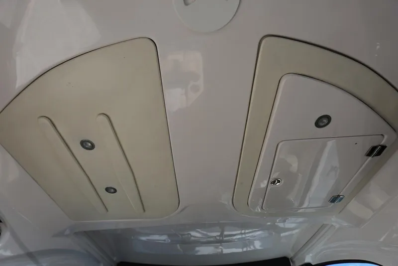 Slide: The Image of Ceiling view of 2012 Regal 35 Sport Coupe with storage compartments. - 27