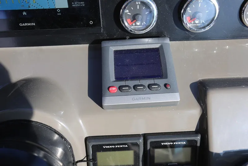 Slide: The Image of Dashboard of 2012 Regal 35 Sport Coupe with Garmin and Volvo Penta displays. - 34