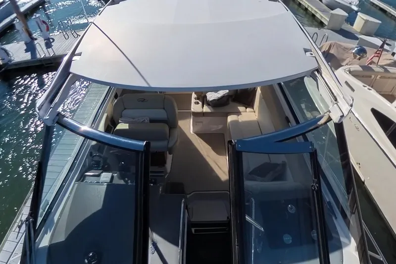 Slide: The Image of 2012 Regal 35 Sport Coupe yacht interior view at marina dock. - 43