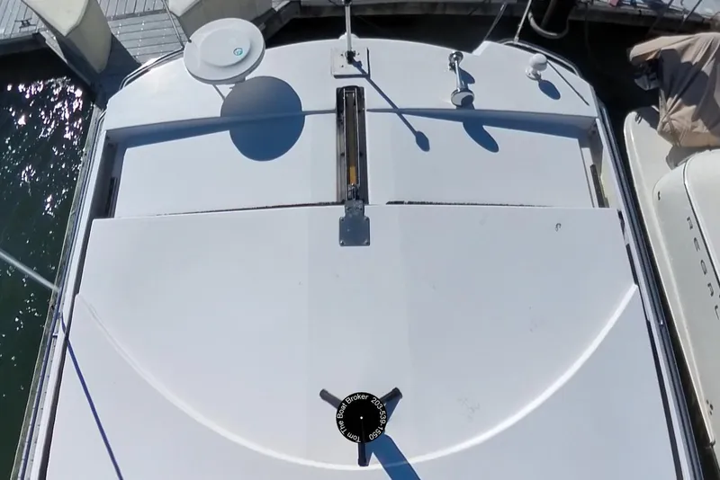 Slide: The Image of Overhead view of 2012 Regal 35 Sport Coupe boat docked at marina. - 45
