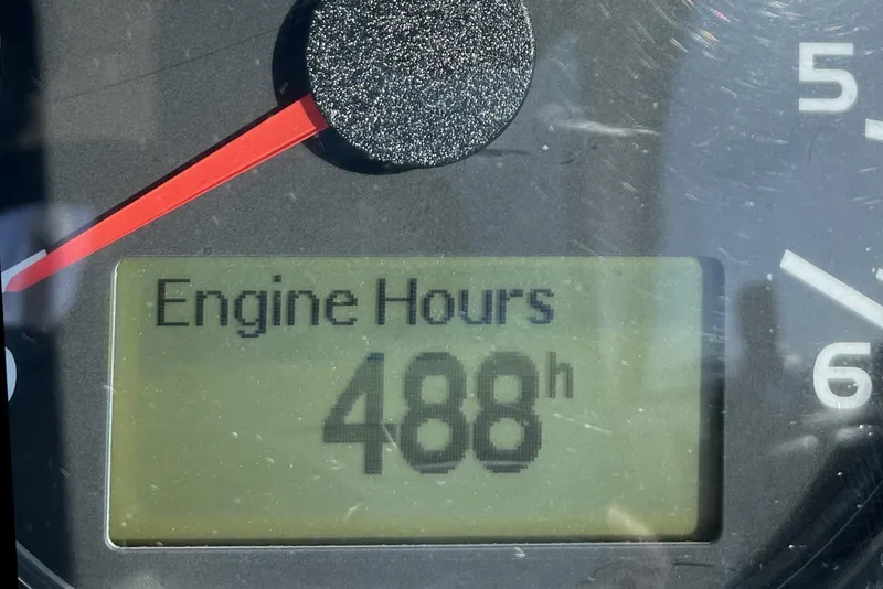 Slide: The Image of Close-up of a 2012 Regal 35 Sport Coupe engine hour meter displaying 488 hours. - 48