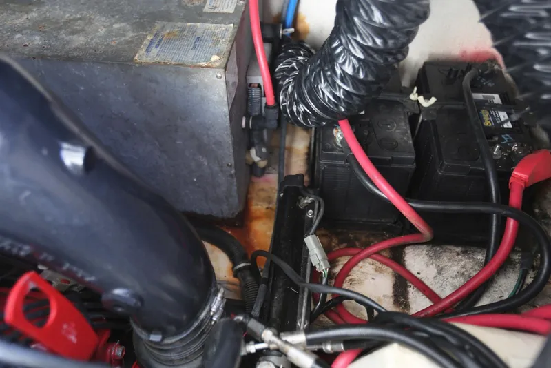Slide: The Image of Engine compartment of 2012 Regal 35 Sport Coupe with batteries and wiring. - 53
