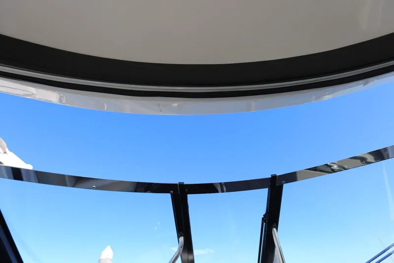 Slide: The Image of View from Regal 35 Sport Coupe 2012, showcasing clear blue sky through windshield. - 61
